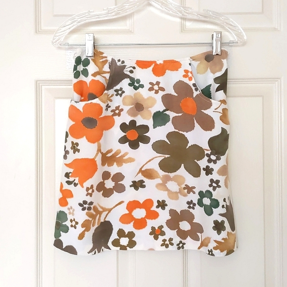 NWOT. Vintage Express 100% Rayon Mini Skirt with Multi Color Flowers.